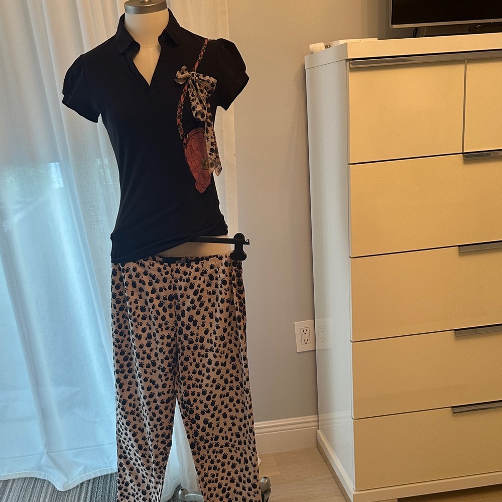 Love Moschino Black Polo Shirt with matching dog paw pants.
